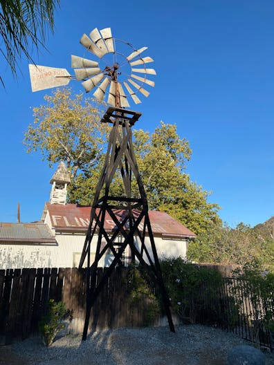 Vintage Train Car in Rustic Setting - Image 1