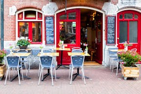 Cozy Cafe on the Famous Amsterdam Canals - Image 1