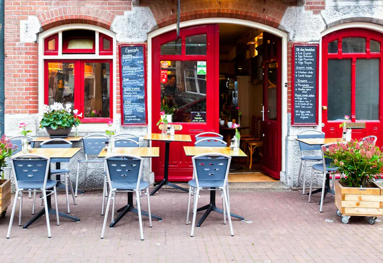 Cozy Cafe on the Famous Amsterdam Canals - Image 1