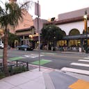 A modern retail space with attached garden and garden office