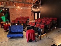 Gorgeous Space with moveable Seats and Red Velvet Curtains - Image 16