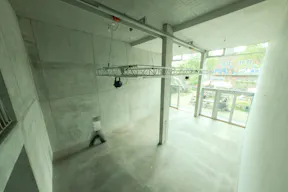 Brutalist Event & Retail Space with Rooftop and Garden - Image 5