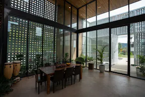 Concrete Oasis: A Villa Retreat with Poolside Serenity - Image 6