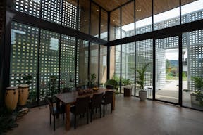 Concrete Oasis: A Villa Retreat with Poolside Serenity - Image 6