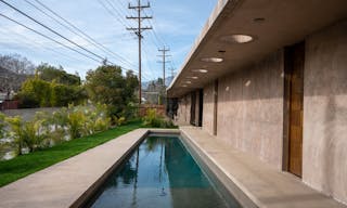 Concrete Oasis: A Villa Retreat with Poolside Serenity - Image 13