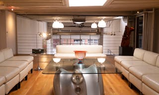 Stunning Mezzanine Lounge Overlooking Classic Car Showroom - Image 6