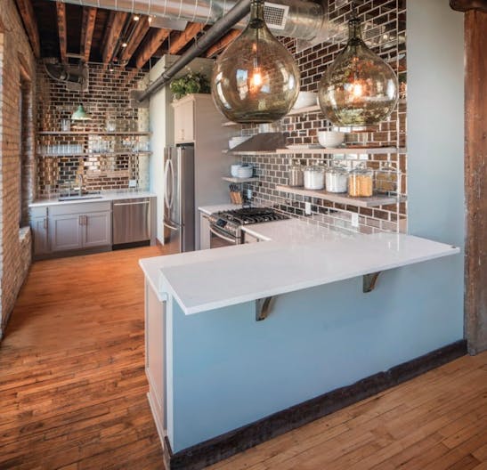 Historic North Loop Brownstone Loft with Rooftop Space - Image 4