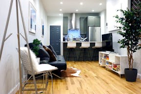 Minimalist mid-century modern lounge space and modern kitchen - Image 7