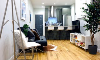 Minimalist mid-century modern lounge space and modern kitchen - Image 7