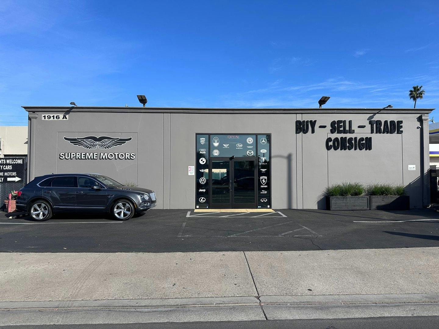 Luxury Car Dealership in Warehouse Space