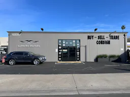Luxury Car Dealership in Warehouse Space - Image 9