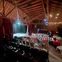 Gorgeous Space with moveable Seats and Red Velvet Curtains