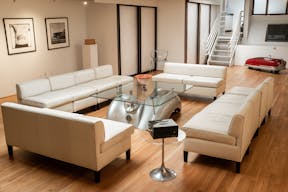 Stunning Mezzanine Lounge Overlooking Classic Car Showroom - Image 2