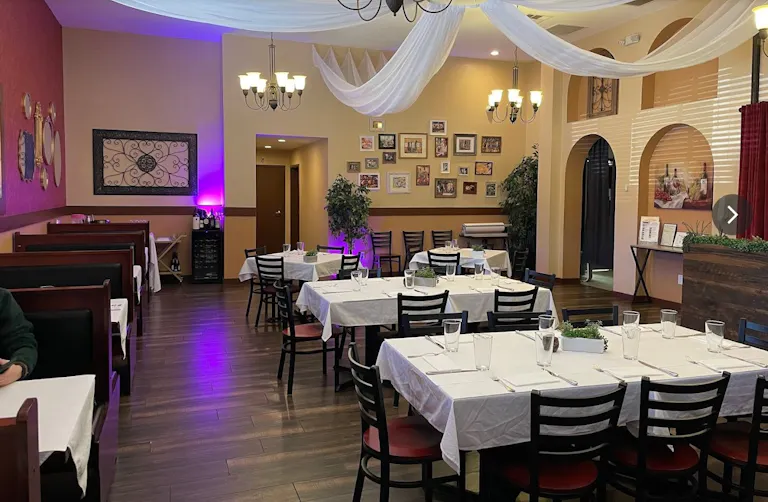 Elegant Restaurant Dining Space with TV's and Full Bar - Image 0