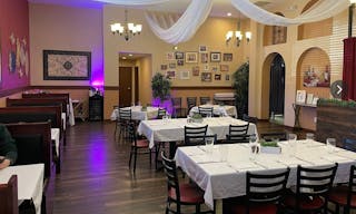 Elegant Restaurant Dining Space with TV's and Full Bar - Image 0