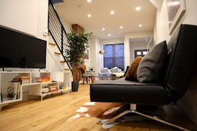 Minimalist mid-century modern lounge space and modern kitchen - Image 0