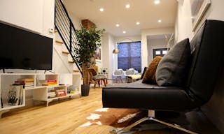 Minimalist mid-century modern lounge space and modern kitchen - Image 0