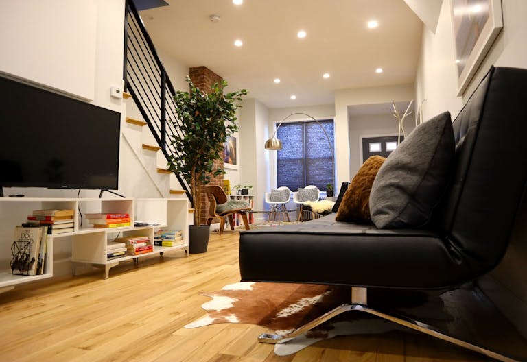 Minimalist mid-century modern lounge space and modern kitchen - Image 0