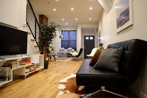 Minimalist mid-century modern lounge space and modern kitchen - Image 3