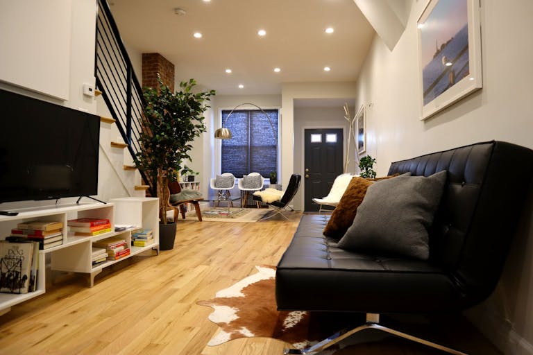 Minimalist mid-century modern lounge space and modern kitchen - Image 3