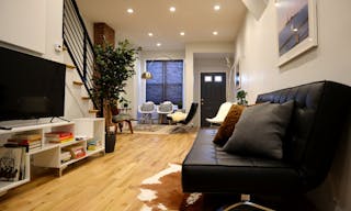 Minimalist mid-century modern lounge space and modern kitchen - Image 3