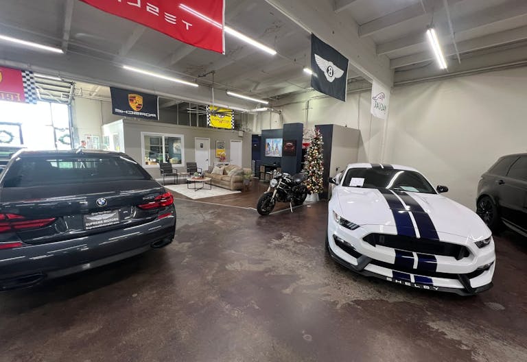 Luxury Car Dealership in Warehouse Space - Image 2