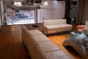 Stunning Mezzanine Lounge Overlooking Classic Car Showroom - Image 7