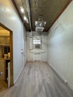 Store Front in the heart of the Lower East Side in NYC. Blank slate do what you want in a fully built out space. - Image 2