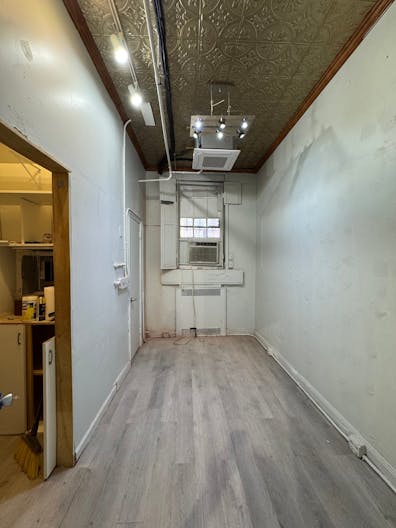 Store Front in the heart of the Lower East Side in NYC. Blank slate do what you want in a fully built out space. - Image 2