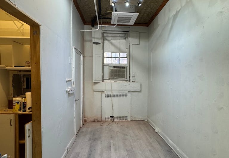 Store Front in the heart of the Lower East Side in NYC. Blank slate do what you want in a fully built out space. - Image 2