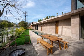 Concrete Oasis: A Villa Retreat with Poolside Serenity - Image 12