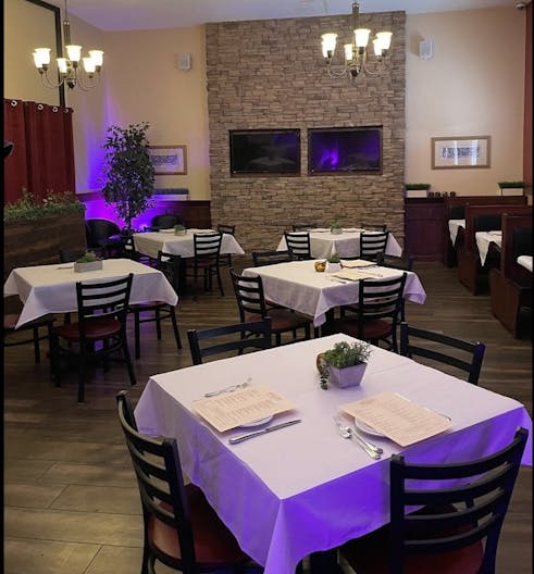 Elegant Restaurant Dining Space with TV's and Full Bar - Image 1