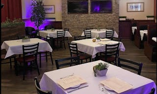 Elegant Restaurant Dining Space with TV's and Full Bar - Image 1