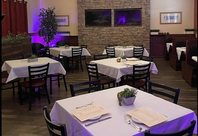 Elegant Restaurant Dining Space with TV's and Full Bar - Image 1