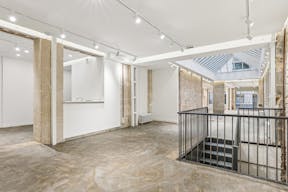 Un espace Pierre blanche, brique et verrière dans le Grand Marais - Image 7