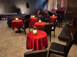 Gorgeous Space with moveable Seats and Red Velvet Curtains - Image 14