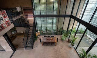 Concrete Oasis: A Villa Retreat with Poolside Serenity - Image 9