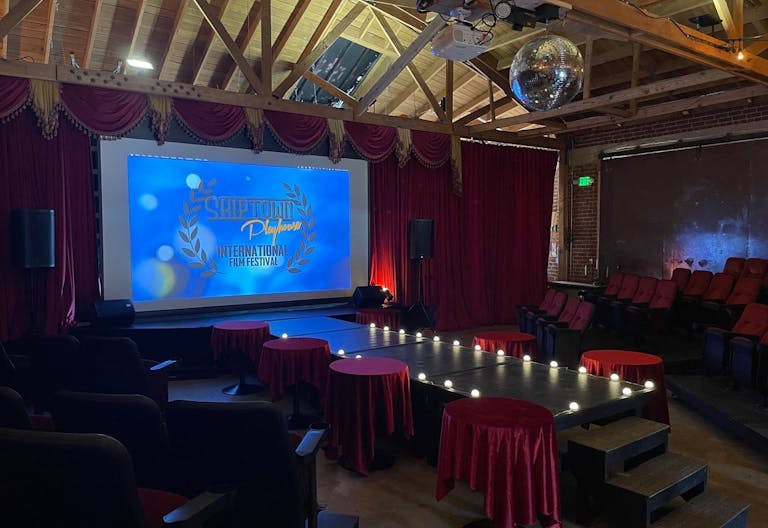 Gorgeous Space with moveable Seats and Red Velvet Curtains - Image 2