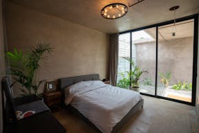 Concrete Oasis: A Villa Retreat with Poolside Serenity - Image 15