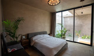 Concrete Oasis: A Villa Retreat with Poolside Serenity - Image 15