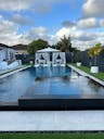 West Kendal Home with resort style infinity pool.