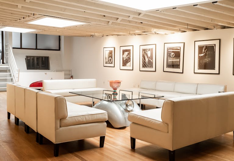 Stunning Mezzanine Lounge Overlooking Classic Car Showroom - Image 1