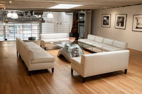 Stunning Mezzanine Lounge Overlooking Classic Car Showroom - Image 3