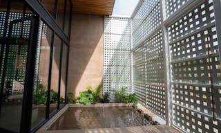 Concrete Oasis: A Villa Retreat with Poolside Serenity - Image 2